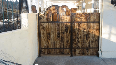 Wood and iron combined to make a rustic gate